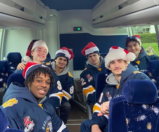 Burlington Cougars Spread Holiday Cheer at the Santa Claus Parade!